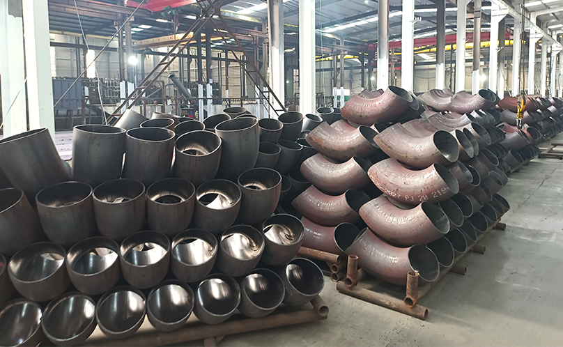 Cómo mejorar la dureza del codo prensado en caliente de acero al carbono